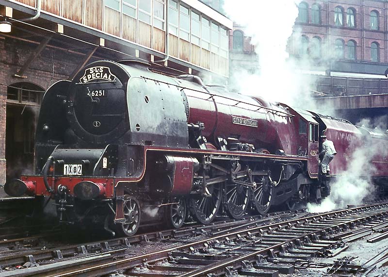 Ex-LMS 8P Coronation Class 4-6-2 No 46251 'City of Nottingham' arrives in New Street station on a SLS Special on 12th July 1964