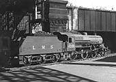 Ex-LMS 5P4F 2-6-0 'Crab' No 42818 is seen on pilot duties as it takes forward from Platform 7 an empty stock working to Vauxhall carriage sidings