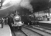 Monument Lane shed's 2F 0-6-0 No.58271 heads a southbound enthusiasts' special, waiting to leave Birmingham New Street's Platform 9