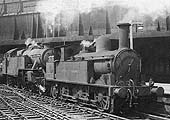 Ex-LNWR 2F 0-6-2T 'Coal Tank' No 58928, on pilot duties, and  ex-LMS 4MT 2-6-4T No 42267 are seen enetering Platform 5 having passed under Navigation Street bridge