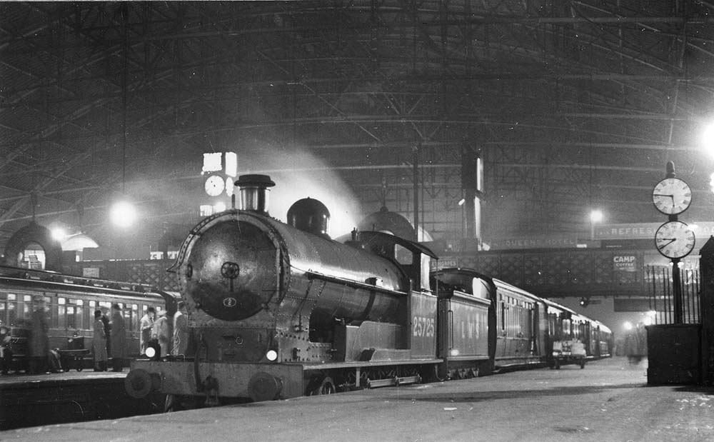 Ex-LNWR 4-6-0 Prince of Wales class No 25725 is seen standing at Platform 1 whilst at the head of a Class A up express service to Coventry