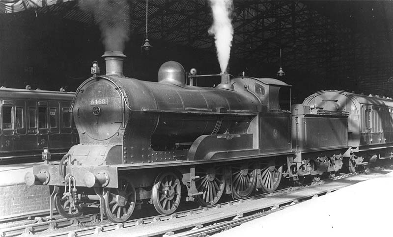 Ex-LNWR 4-6-0 Prince of Wales class No 5466 'Lady of the Lake' looks resplendent in Crimson Lake livery whilst at the head of a Class D down service