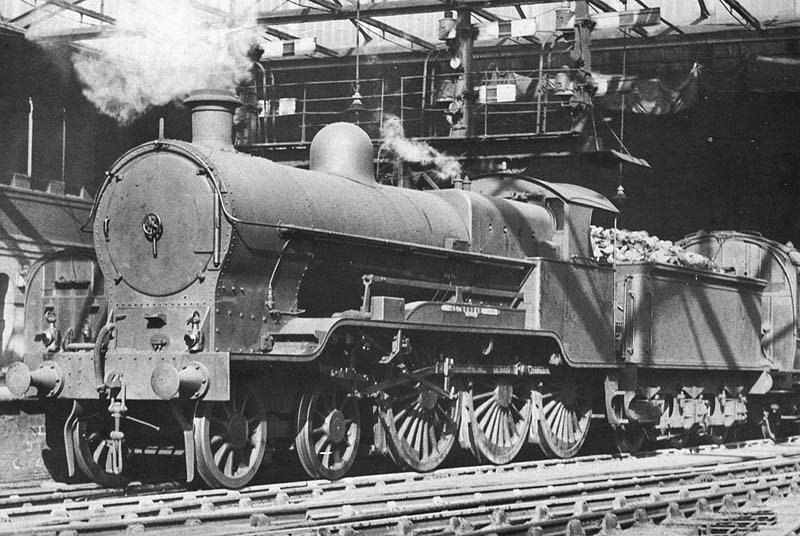 Ex-LNWR Prince of Wales class No 5672 'Condor' is seen standing at Platform 2 whilst at the head of a Birmingham to Manchester express service