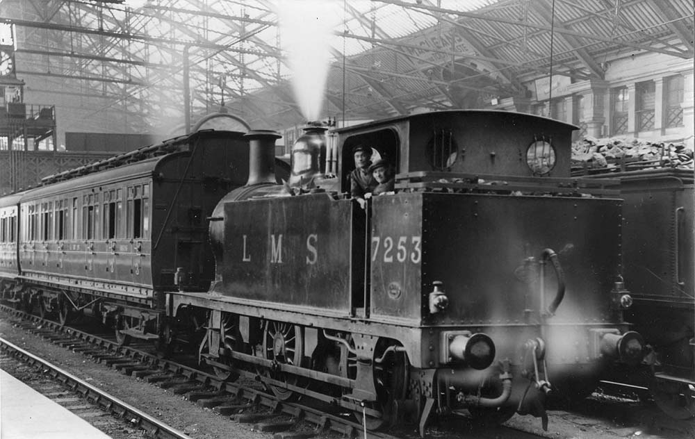 Ex-Midland Railway 3F 0-6-0T No 7253 is seen standing on the middle road between Platforms 1 and 2 whilst acting as East end station pilot moving empty stock