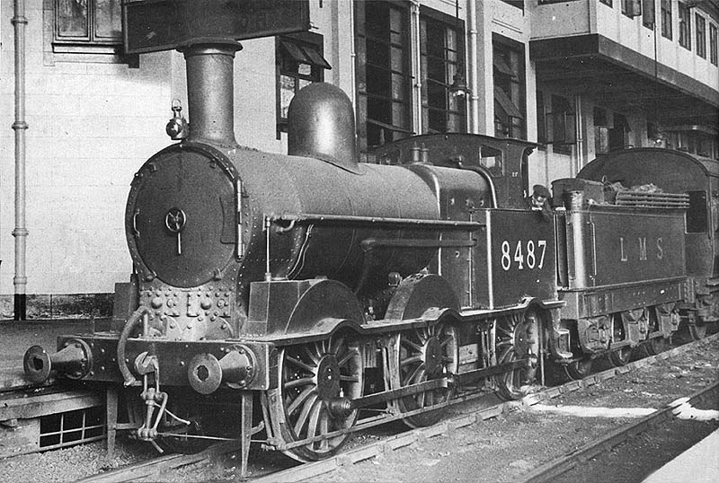 Ex-LNWR 2F 0-6-0 18in Goods Engine No 8487 is seen standing in the Stour Valley bay at the head of the 4 08pm New Street to Harbourne service