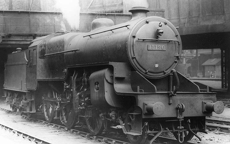 LMS 5P4F 2-6-0 'Horwich Crab' No 13120 is seen held by signals whilst standing under Navigation Street bridge at the West end of New Street station