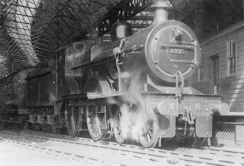 Midland Railway 2P 4-4-0 No 527 is now seen standing at the East end of Platform 4 at the head of a local passenger service to Kings Norton and beyond