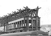 Close up showing the remains of the roof ironwork and the empty shell of New Street Signal Cabin No 4