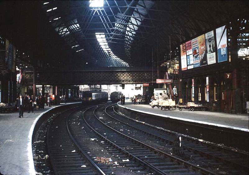 The West end of New Street station's Platform 8, the side of the original Platform 5 which handled local traffic, with the passenger footbridge in the middle distance