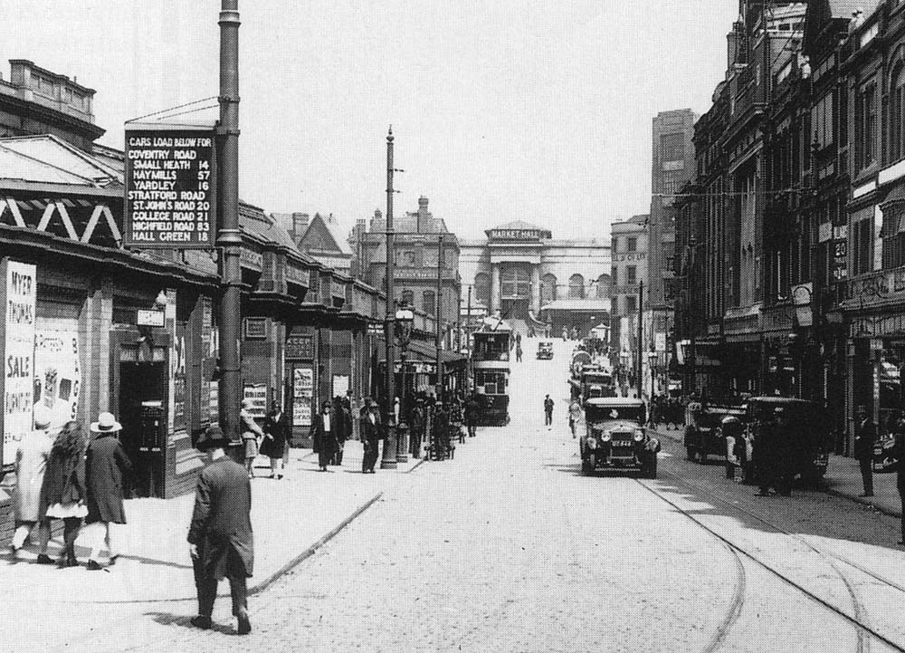 Close up showing the entrance from Station Street in to the station via both the passenger footbridge and the adjacent cab driveway