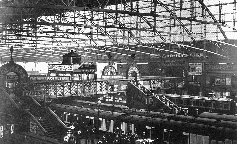 View from the Queens Hotel showing a typical busy sunny afternoon scene at New Street station