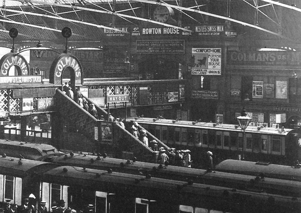 Close up showing the archway through which passengers walked to the newly erected station extension