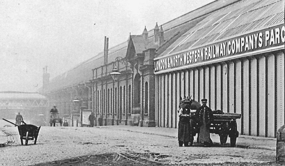 Looking down Queens Drive from the junction with Worcester Street whilst on the right is the LNWR parcels offices and the steel girder forming part of the wall to the  depot