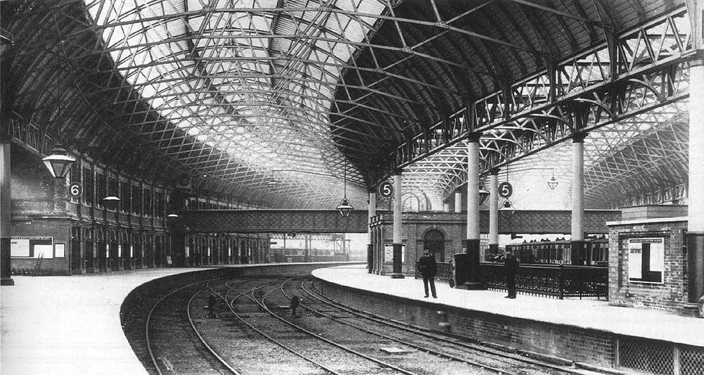 View of New Street's newly opened extension showing Platforms 6 on the left and a set of LNWR carriages standing at Platform 5's up platform