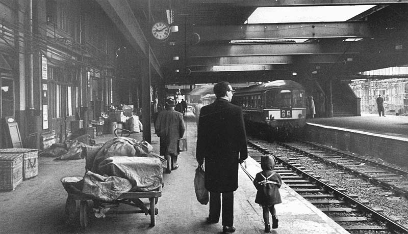 Looking East along Platform One in November 1965 whilst opposite Platform Three the erection of the new station continues apace