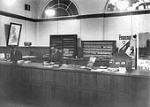 View of the new LMS Enquiry Office opened in 1930 and located in one of the original entrance archways in Stephenson Place