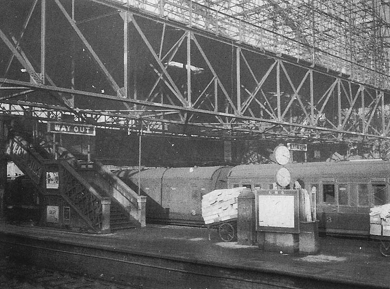 View of the travelling gantry in action over Platforms 4 and 5 deployed to assist in the safe demolition of Cowper's great roof