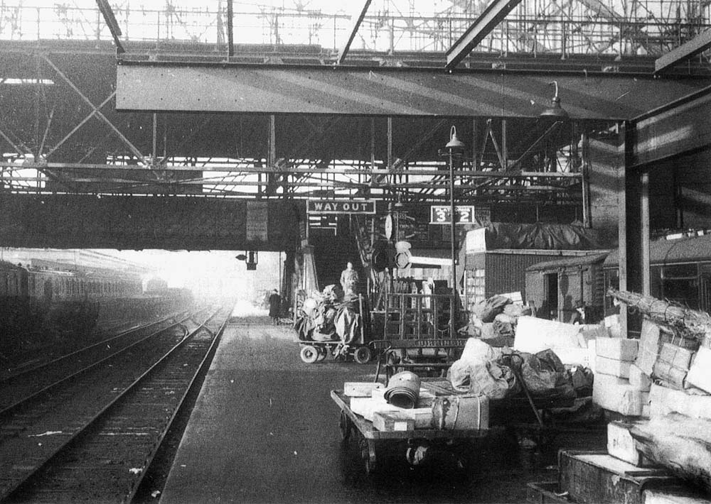 Looking West along Platform 3 showing the final stages of the removal of the last two steel trusses of Cowper's great roof