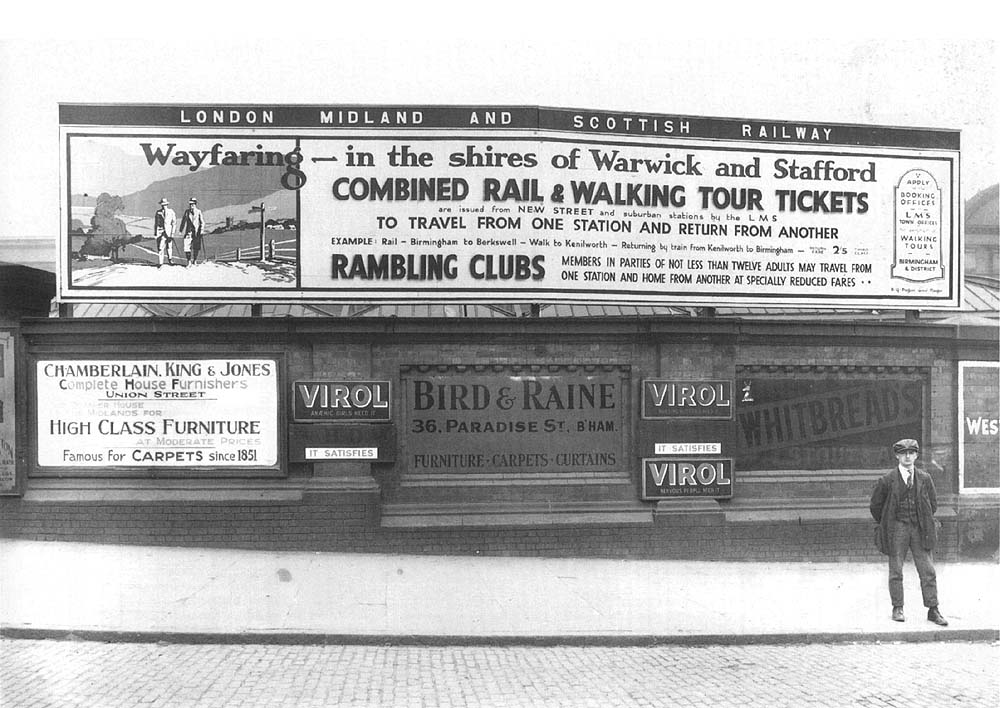 View of the LMS advertising hoarding sited in Hill Street to the left of the entrance to the fish, milk and carriage loading yard