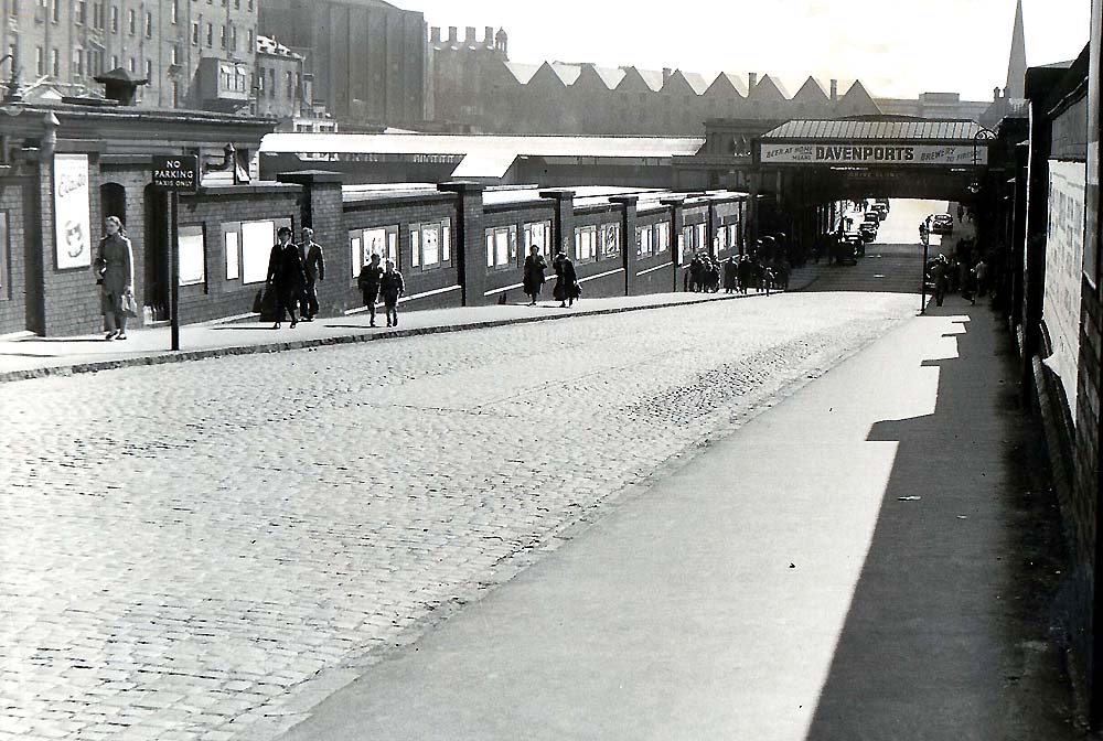 Looking Eastwards along Queens Drive towards the entrance to the portions of the station in 1952