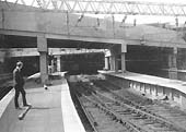 Looking beneath the entrance and exit roads into the former Midland Railway portion of New Street station in September 1966