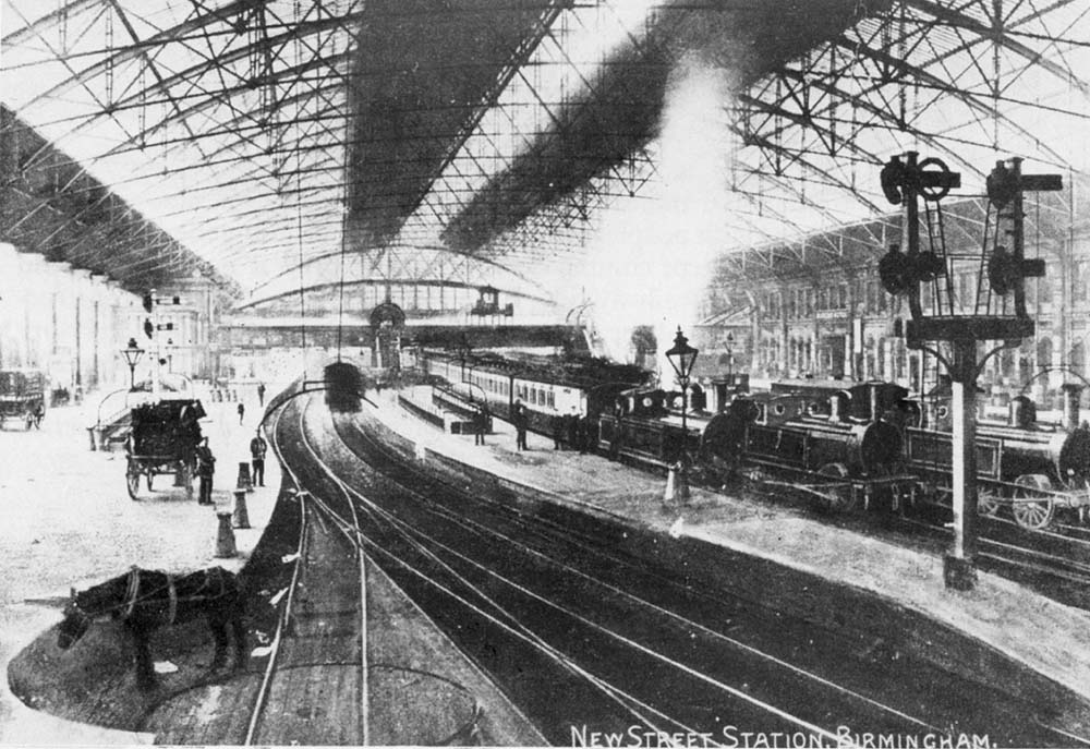 Looking towards Wolverhampton from above the carriage and parcels dock with a wagon turntable and shunting horse in the foreground