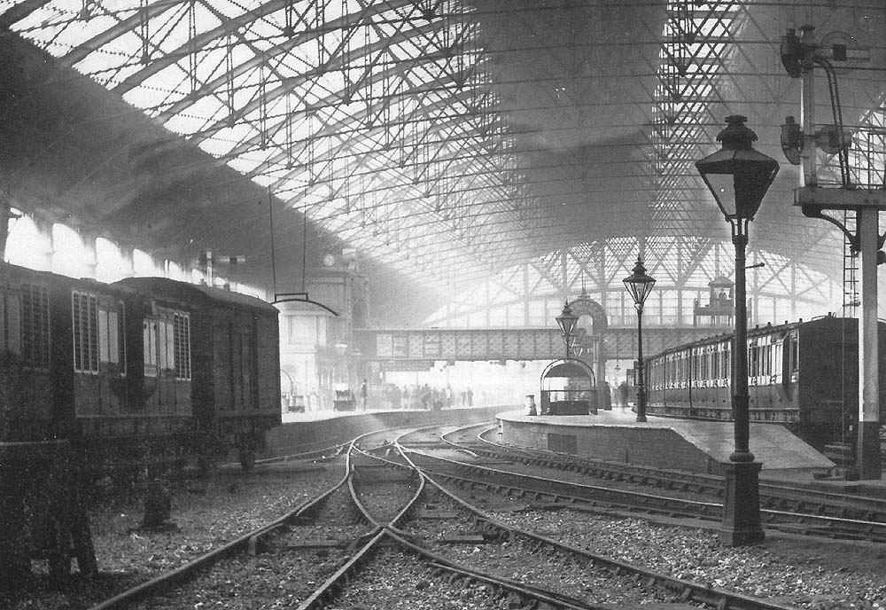 Close up of the parcels dock and carriage landing showing two ventilated vans used for milk transportation and a standard van used for perishables