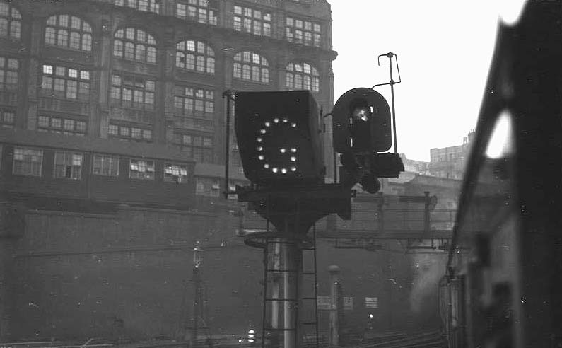 View of one of New Street station's colour lights controlling departures from the West end of the station installed after the removal of the roof