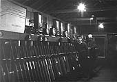 An internal view of New Street No 2 Signal Box with 'bobbies' Walter Pritchard and a Mr Bing posing for the camera between duties on 20th March 1954