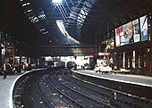 The West end of New Street station's Platform 8, the side of the original Platform 5 which handled local traffic, with the passenger footbridge in the middle distance