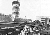 An elevated view of the demolition of the main station building on Midland portion of New Street station with Rotunda rising in the background
