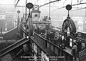 View of No 3 Signal Cabin showing the addition of the four-sided clock prior to the eection of the tarpaulin roof and removal of arches over the footbridge steps