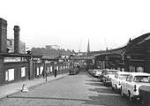 Looking down the slope of the Western entrance of Queens Drive with the covered central driveway now removed following bomb damage