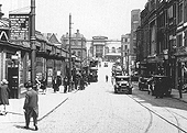 Close up showing the entrance from Station Street in to the station via both the passenger footbridge and the adjacent cab driveway