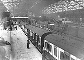 Looking West along Platform 3 with on the right a rake of LNWR 57 ft lavatory stock coaches built during the First World War period