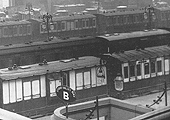 Close up showing the Stour Valley Bay sign and some six-wheel coaching stock standing on the Western portion of Platform One