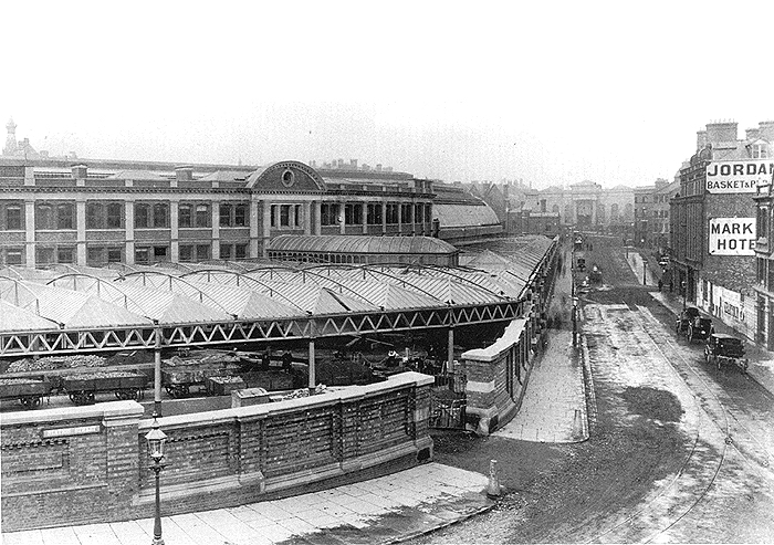 Looking down the newly built Station Street towards the front of the Market Hall with the entrance to the cart road leading to the fish and milk sidings on the left