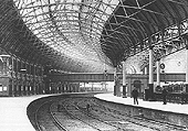 View of New Street's newly opened extension showing Platforms 6 on the left and a set of LNWR carriages standing at Platform 5's up platform