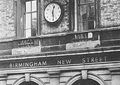 View of the new clock provided above the passenger entrance to New Street station from the Queen's Hotel in Stephenson Place