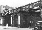 View of the entrance to the Midland' portion of the station off Station Street with the pedestrian access to the footbridge on the left and access to the Cab Driveway on the right