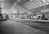 Looking towards the West end of Platform 3 from the parcels sidings with LMS 2-6-2T No 143 standing at the head of a Class B stopping passenger service