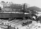 An aerial view of the West end of New Street station showing the trackwork approaching to the station and part of the turntable