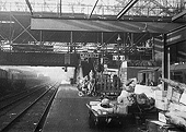 Looking West along Platform 3 showing the final stages of the removal of the last two steel trusses of Cowper's great roof