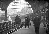 Looking along Platform 10, originally Platform 6, towards New Street No 2 Signal Box and Queens Drive bridge whilst an unknown ex-LMS 4-6-0 stands on the centre road