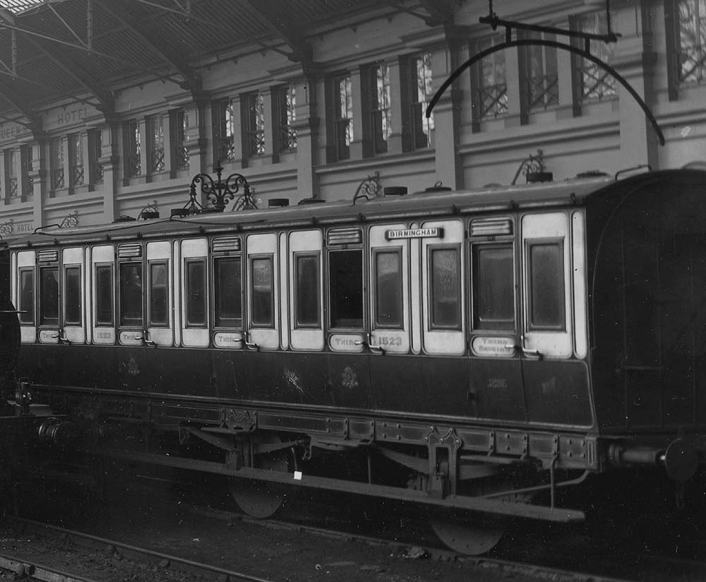 Close up showing a 32 foot five-compartment all third six-wheel carriage No 1523 built  about 1880
