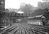 Looking West from under Navigation Street bridge towards the smoke filled tunnel that commenced at Suffolk Street with New Street No 5 Signal Box to the right
