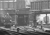 Close up showing the Stour Valley bay lines with an unidentified ex-LMS 2P 4-4-0 locomotive being held by the signal after coming off a local passenger train at Platform 2A