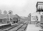 Close up of Birdingbury station's goods yard with the signal box on the right immediately at the end of the down platform