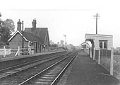 An early post nationalisation view of Birdingbury station looking towards Rugby with the goods yard and signal box still in use on 22nd June 1951