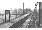View from an up train and looking in the direction of Leamington showing Birdingbury's down platform and waiting room seen on the left